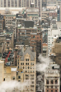 High angle view of buildings in city