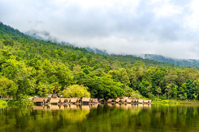 Timelapse of huay tueng tao lake in chiang mai, thailand, with mountains and moving clouds