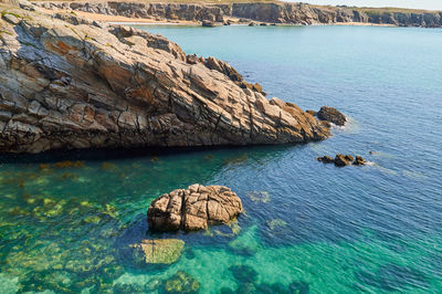 Clear sea on the wild coast of quiberon the rocky coast on the atlantic