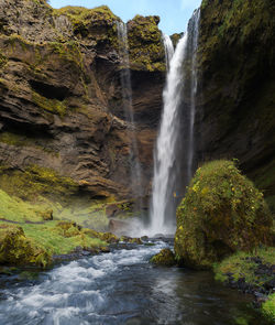 Scenic view of waterfall in forest