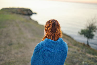 Rear view of woman looking away