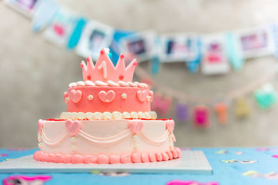 Close-up of birthday cake on table