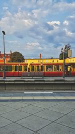 Train on railroad tracks against sky