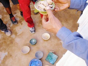 Low section of people with hands