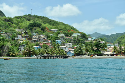 Scenic view of sea by buildings against sky saint lucia