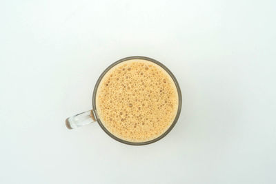 Directly above shot of coffee cup on table