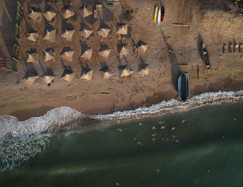 High angle view of sea by beach