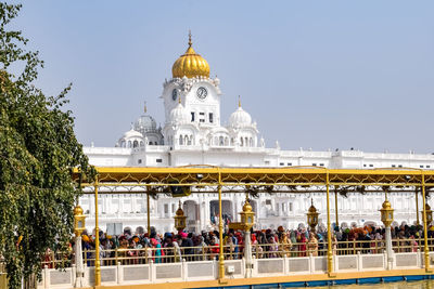 Amritsar, india - february 26 2023 - unidentified devotees from various parts at golden temple