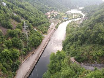 High angle view of river amidst mountains