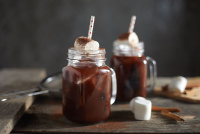 Close-up of coffee in jar on table