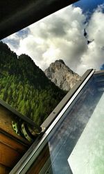 View of mountain range against cloudy sky