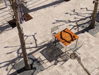 High angle view of bicycle on footpath