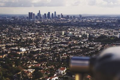 Aerial view of cityscape against sky