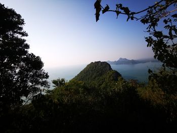 Scenic view of mountains against sky at sunset