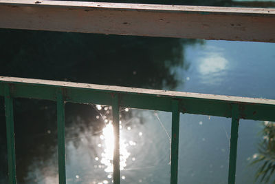 Close-up of railing by window