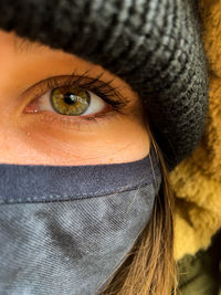 Close-up of woman face wearing mask