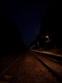 Railroad tracks at night