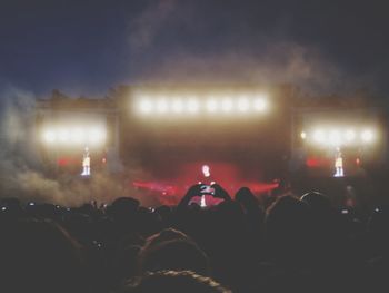 Crowd at music concert at night