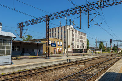 Railroad station platform against the clear sky, train station in elblag, poland.