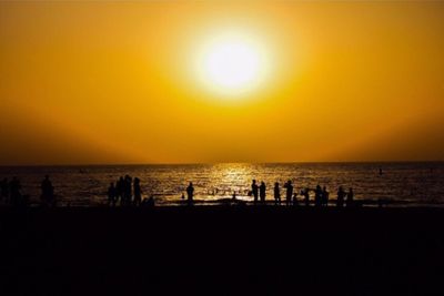 Scenic view of sea at sunset