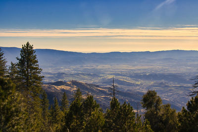 Scenic view of mountains against sky during sunset