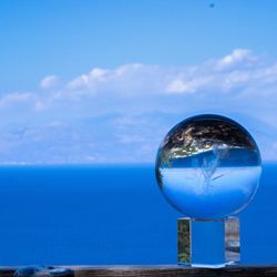 Close-up of blue sea against sky