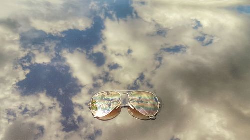 Light painting of sunglasses against sky