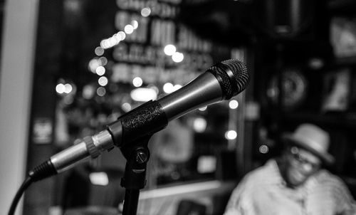 Close-up of microphone in illuminated room