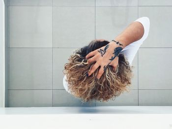 Close-up of man hand with umbrella