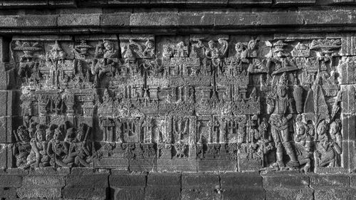 Panoramic shot of sculptures on wall of building