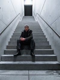 Man sitting on staircase