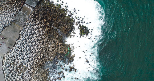 High angle view of rocks on beach