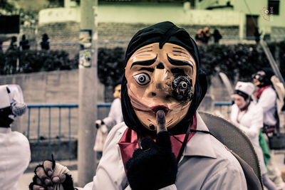 Portrait of boy with mask