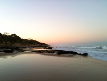 Scenic view of sea at sunset