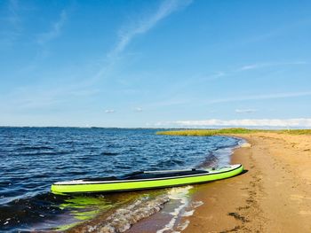Scenic view of sea against blue sky
