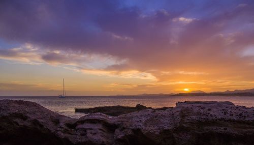 Scenic view of sea against sky during sunset