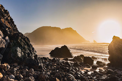 Scenic view of sea against sky during sunset