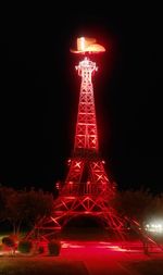 View of illuminated tower at night