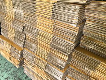 High angle view of cardboard sheets in warehouse