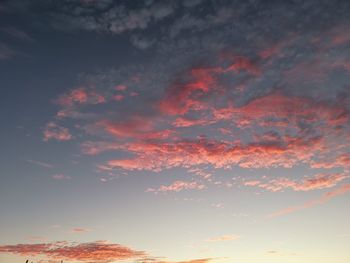 Low angle view of dramatic sky during sunset