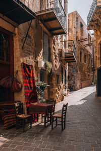 Empty chairs and tables at restaurant