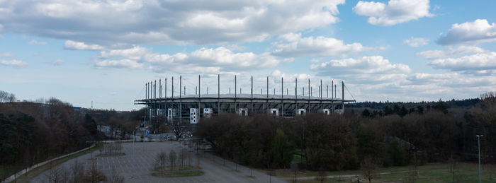Panoramic view of bridge over river against sky