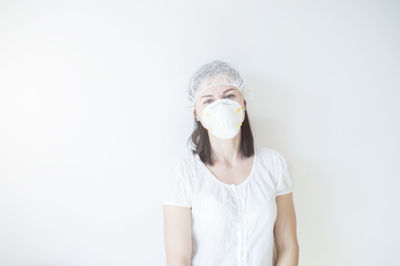 Portrait of teenage girl over white background