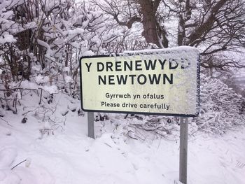 Text on snow covered field