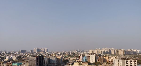 City buildings against clear sky