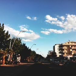 Road with buildings in background