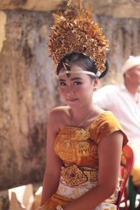 Portrait of smiling woman in traditional clothing 