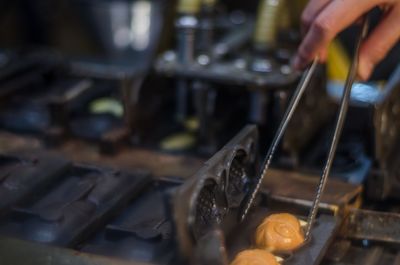 Close-up of hand holding food