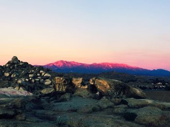 Scenic view of mountains at sunset