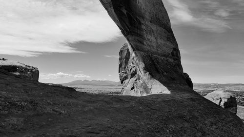 Rock formation on land against sky